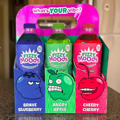 Variety pack on kitchen counter displaying the flavours Brave Blueberry, Angry Apple, and Cheery Cherry. Tagline, 'What's your vibe?'' is placed along the handle.